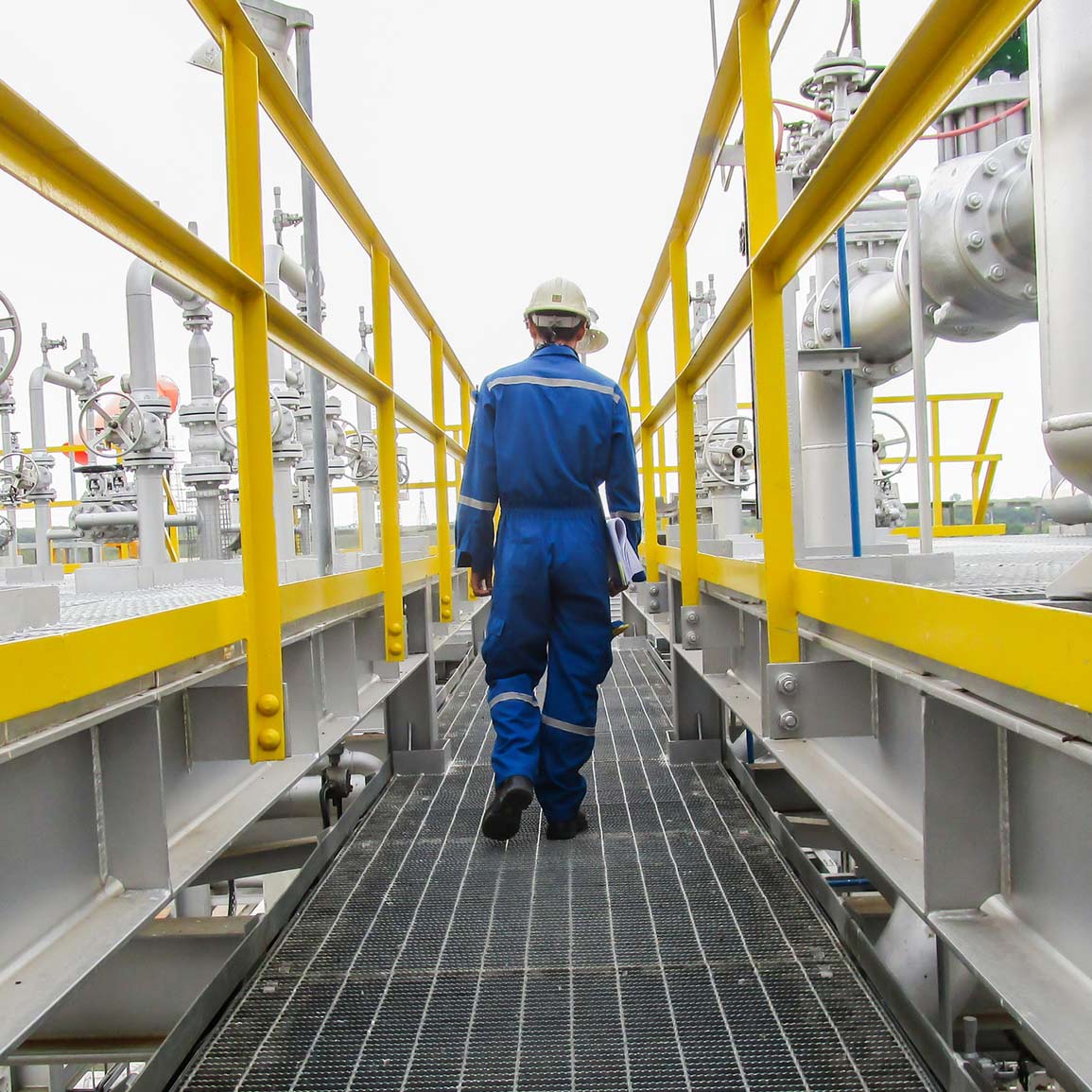 worker in a construction hat and blue suit