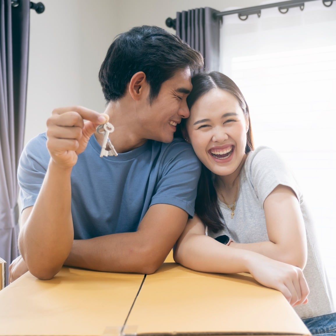 couple with house keys