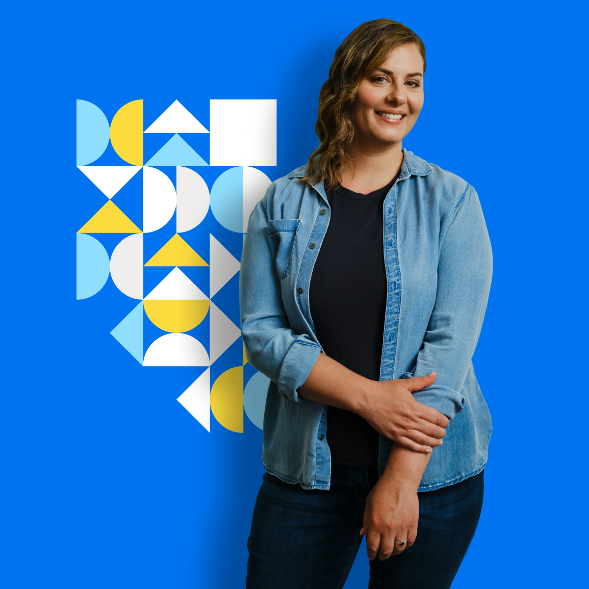 An Albertan woman in front of a blue background