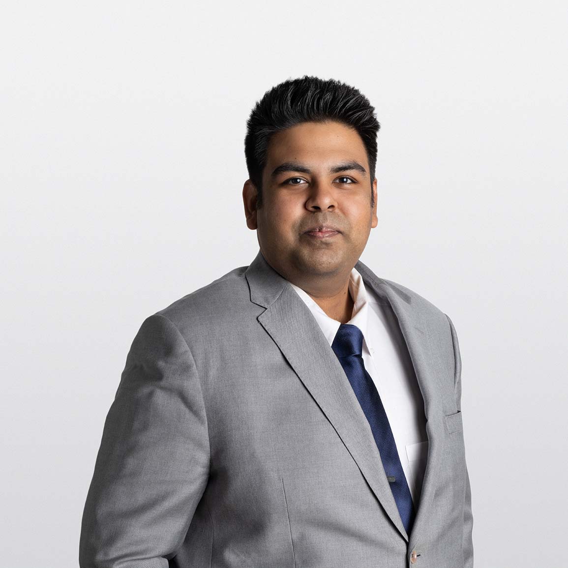 Alt text: Image of Abhishek Ghosh, ATB Financial Advisor, on white background.