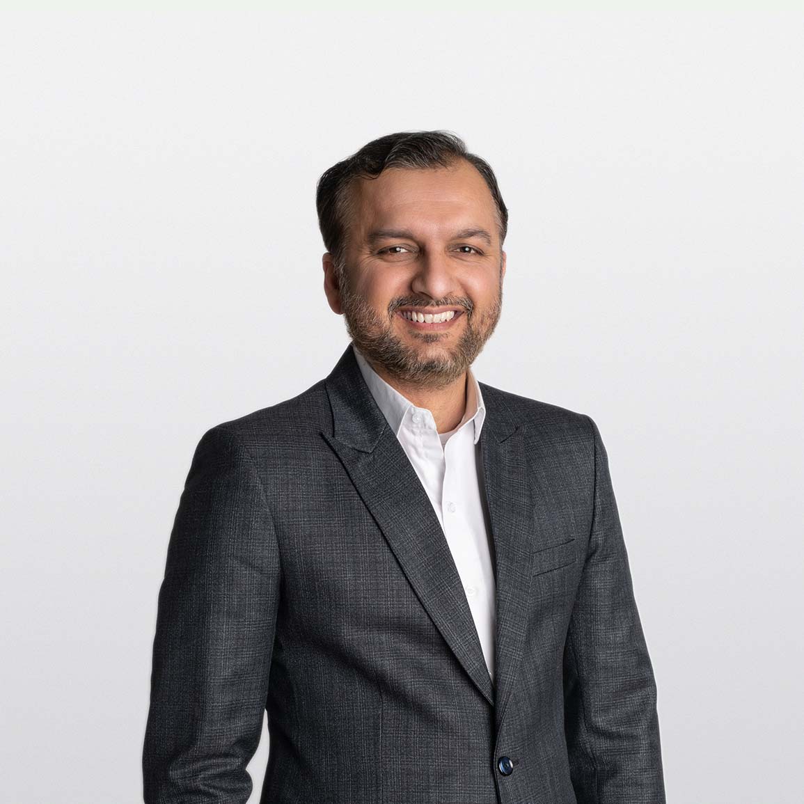 Image of Asif Dhanakwala, ATB Financial Advisor, on white background.
