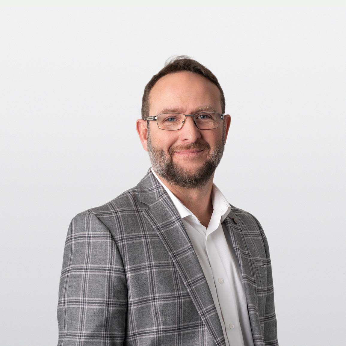 Professional headshot of Curtis Huska, Investment Counselor in ATBIM