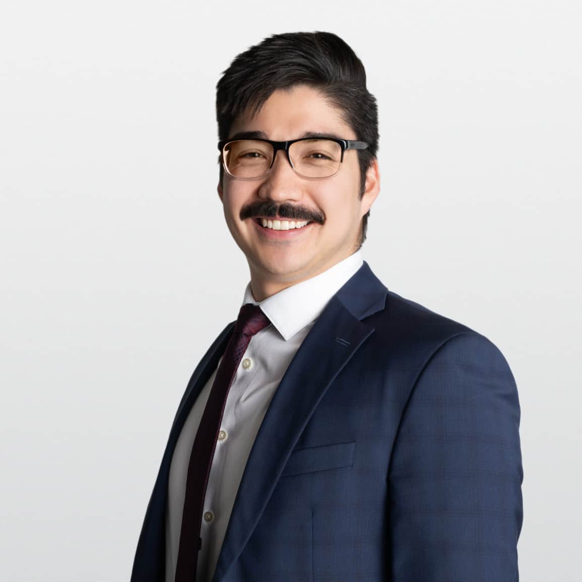 Professional headshot of Alex Richards, ATBIM