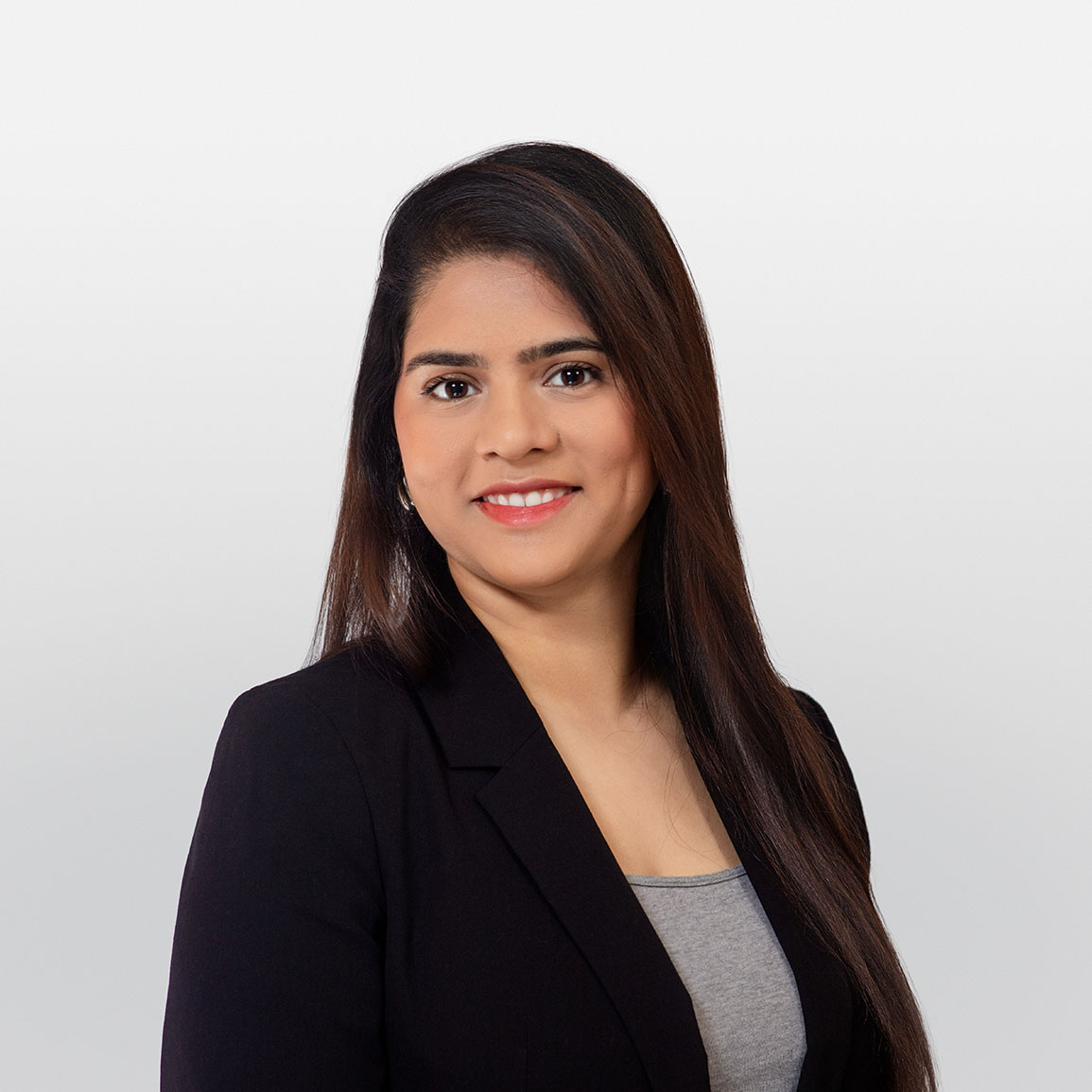 Professional headshot of Nav Cheema, ATBIM