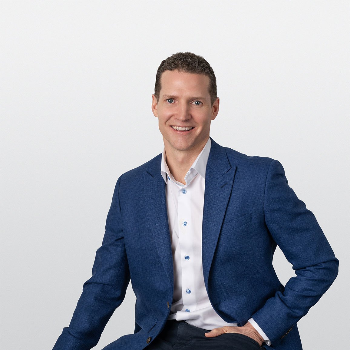 Professional headshot of Tyler Simms, Investment Counselor in ATBIM